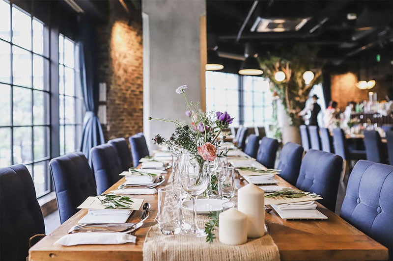 A long wedding table set at JAM ORCHESTRA