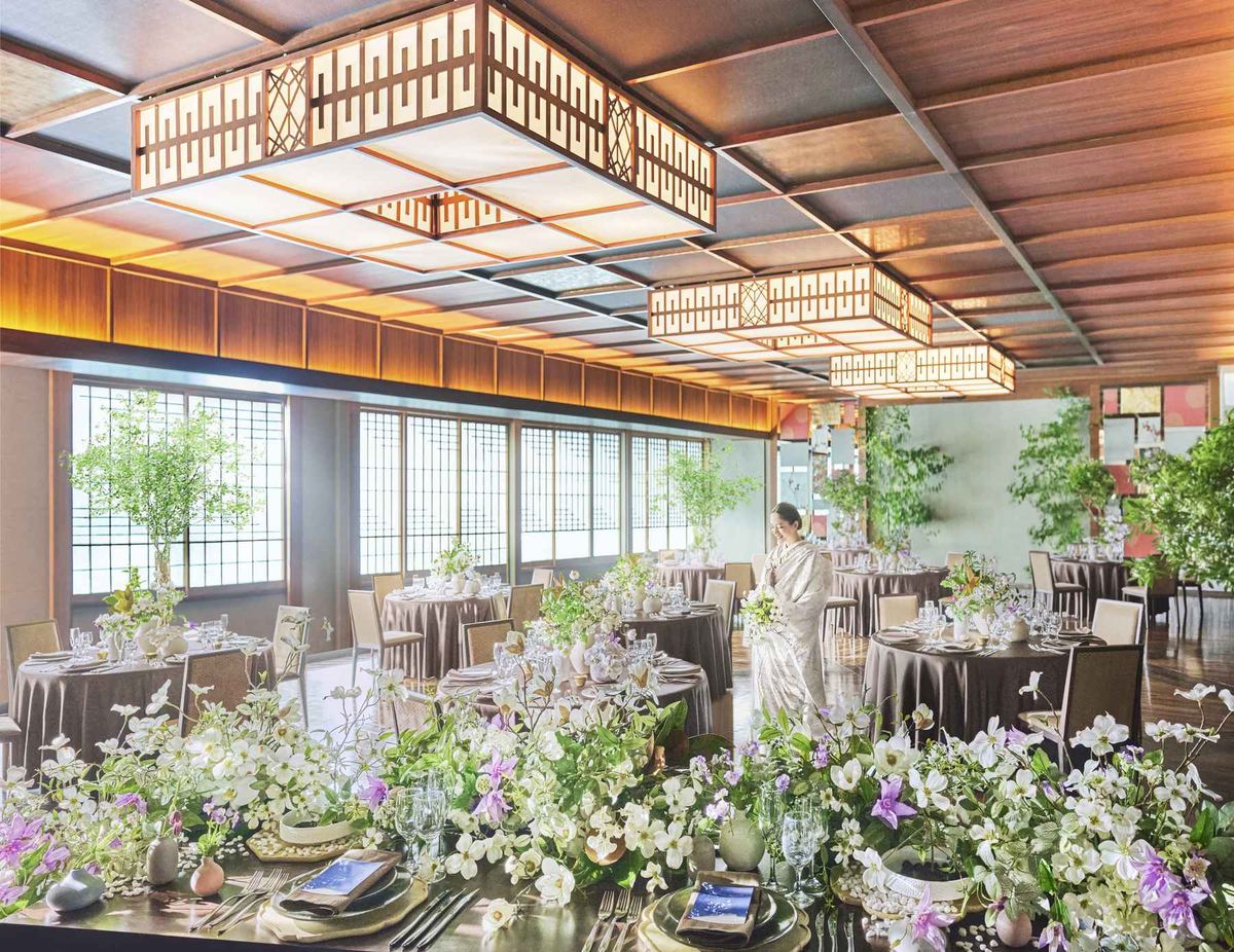 A private banquet hall with Japanese detailing and floral table settings