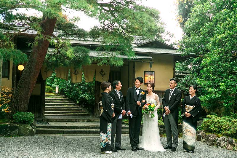A family portrait outside the traditional teahouse at Restaurant Hiramatsu Kodaiji