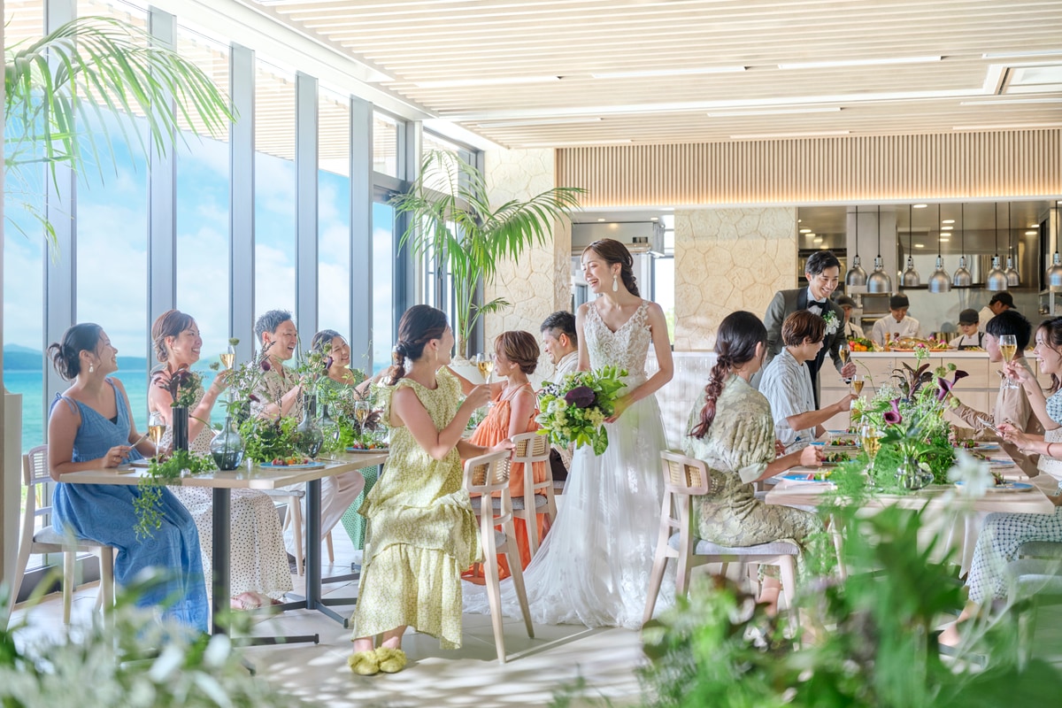 A bride greeting guests at the reception